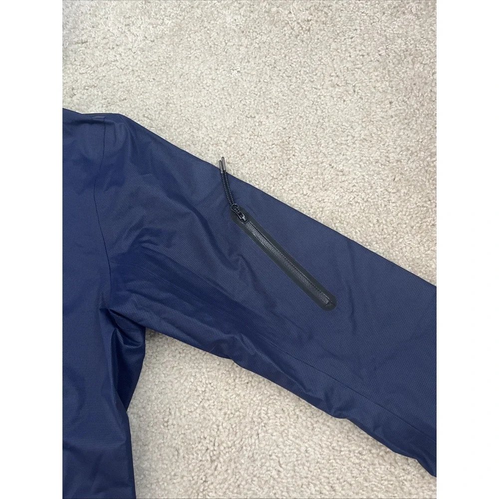 Nike GF New Master Saturday Jacket Black Hyper Blue Water Resistant Nylon Mens